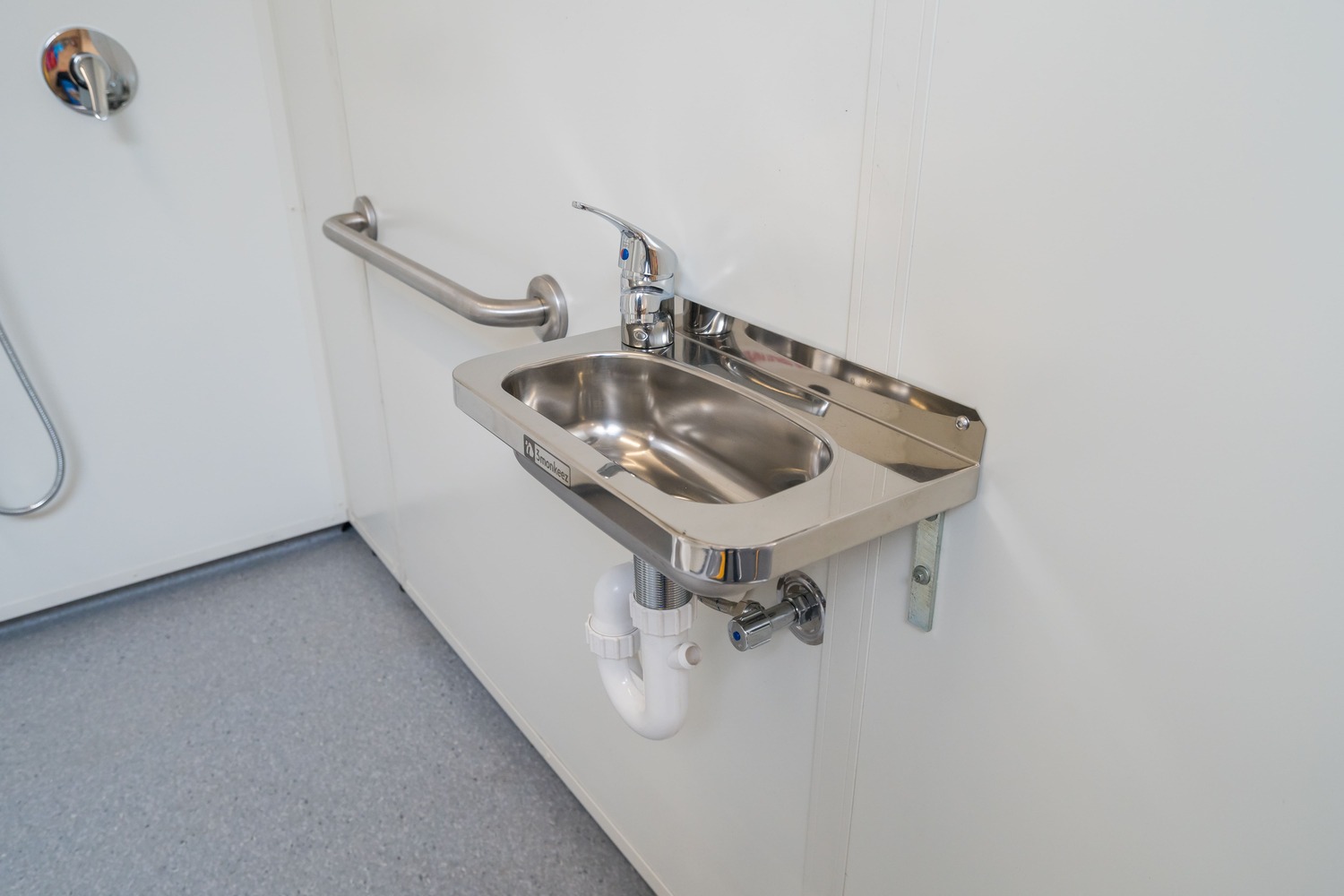Access POD Flex interior showing accessible shower, toilet and grab rails