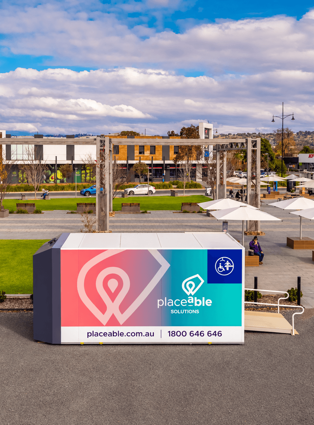 Aerial drone photo of a Placeable Changing Places pod installed in a community shopping precinct